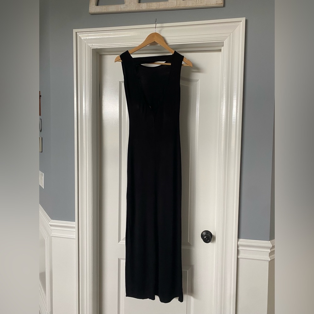 Women’s black dress with open back size small by Roller Coster